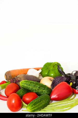 Vegetables cucumbers, tomatoes, beets, on a white background Stock Photo