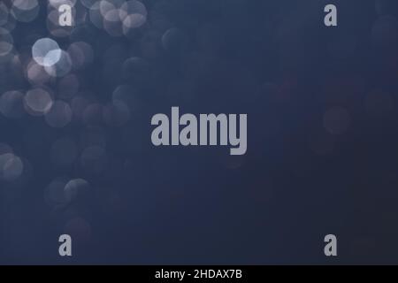 Dark gray grunge background texture with bokeh. Film overlay effect. Stock Photo