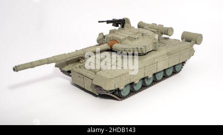Closeup shot of a miniature Soviet tank T-80, in service from 1976, isolated on a white background Stock Photo