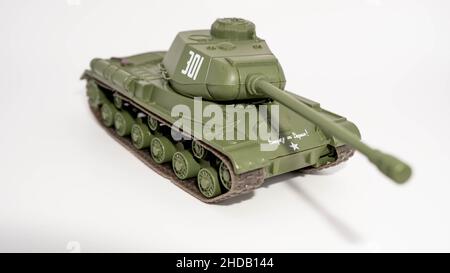 Closeup shot of a miniature Soviet heavy tank KV 85 isolated on a white background Stock Photo