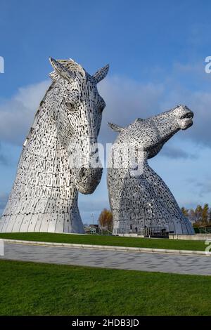The Kelpies in Falkirk, Scotland. Two 30m high (98ft) horse-head sculptures depicting kelpies (shape-shifting water spirits). They stand next to a new Stock Photo