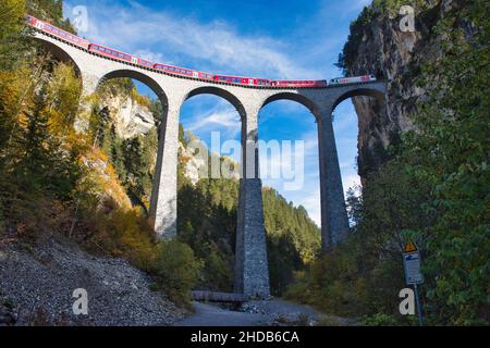 spectacular view at Train crossing Landwasser Viaduct Landwasserviadukt, Graubunden, Switzerland. Stock Photo