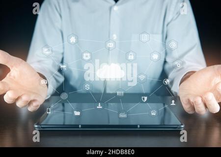 Business man with internet network between hands. Data protection privacy concept. Cyber security network. Cloud icon and internet technology networki Stock Photo