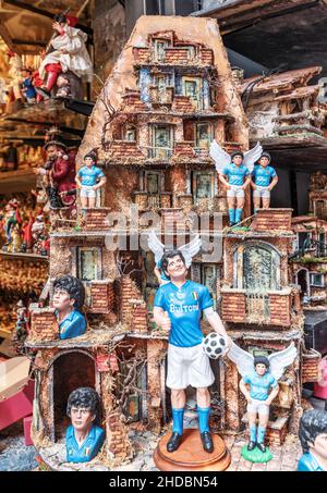 Naples, Italy - june 29 2021: Statuettes by Diego Armando Maradona repeated in the nativity scene in via San Gregorio Armeno Stock Photo