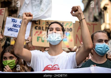 Young people protest during the Climate Strike March on September 24, 2021 in Turin, Italy. Some 16 cities across Europe have planned climate change p Stock Photo