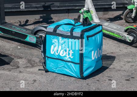 Helsinki, Finland - August 5, 2021: Wolt delivery bag. Wolt is food delivery service. Stock Photo