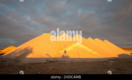 Salt mountains at the Salinas dEs Trenc salt works, Flor de Sal, Es Trenc, Ses Salines, Majorca, Spain Stock Photo