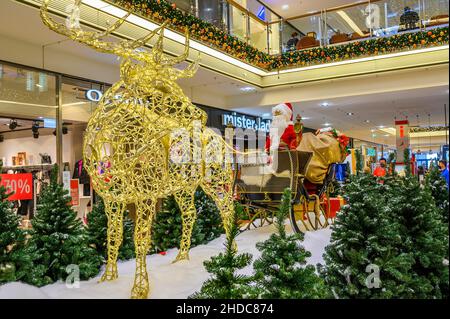 Christmas decorations and Father Christmas in a sleigh with reindeer in Forum Allgaeu, Kempten, Allgaeu, Bavaria, Germany Stock Photo