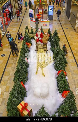 Christmas decorations and Father Christmas in a sleigh with reindeer in Forum Allgaeu, Kempten, Allgaeu, Bavaria, Germany Stock Photo