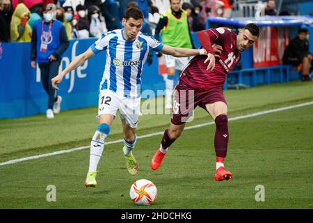 Lazar Randjelovic of CD Leganes in action with Diego Rico of Real Sociedad during the La Copa del Rey third round match between CD Leganes and  Real Sociedad at Butarque Stadium in Madrid, Spain. Stock Photo