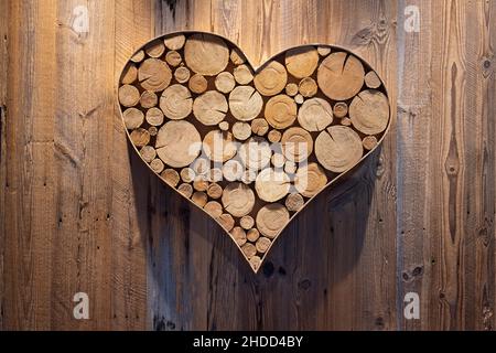 heart shape on old wood filled with end grain pieces for backgrounds and cover sheets Stock Photo