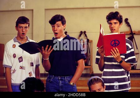 Austin Texas USA, 1991: High school boys rehearse with school choir during music class. ©Bob Daemmrich Stock Photo