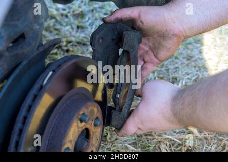 Wheel hub brake disc assembly and service in mechanic repair service Stock Photo