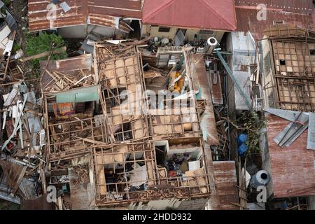 03/01/2022 Cebu City, Philippines. Overhead view of the roofs of houses torn off by Typhoon Odette (International name Rai) which struck the Visayas a Stock Photo