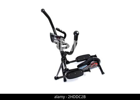 Elliptical trainer isolated on white background, top-side view. Sports equipment for training at the gym or home. Themes of sports lifestyle and body Stock Photo