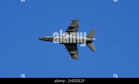 Thiene Italy OCTOBER, 16, 2021 Ground attack airplane in flight armed in the blue sky. Copy Space. AMX Ghibli of Italian Air Force subsonic military fighter jet aircraft Stock Photo