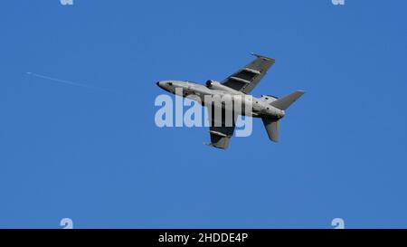 Thiene Italy OCTOBER, 16, 2021 Ground attack airplane in flight armed in the blue sky. Copy Space. AMX Ghibli of Italian Air Force subsonic military fighter jet aircraft Stock Photo