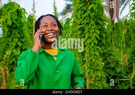 overexcited farmer making call Stock Photo
