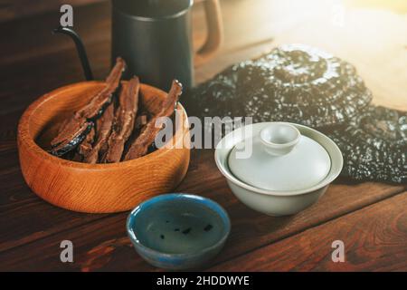 Brewed Dried Chinese Lingzhi , Ganoderma Lucidum or Reishi mushroom. Asian herbs for health. Stock Photo