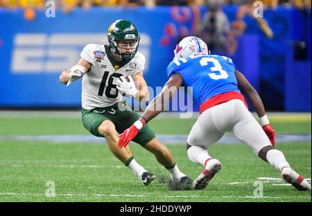 New Orleans, LA, USA. 01st Jan, 2022. The Mississippi Rebels offense faces  the Baylor Bears defense at midfield during the third quarter of the  Allstate Sugar Bowl Bowl college football game at