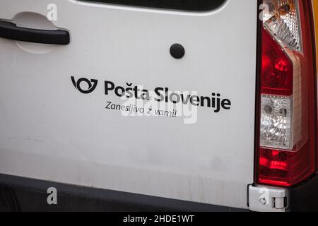 Picture of a sign with the logo of Posta Slovenije on one of their post vehicles in Ljubljana, Slovenia. The Post of Slovenia is a state-owned company Stock Photo