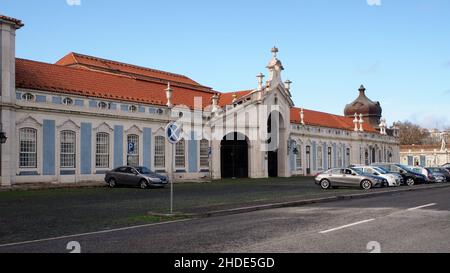 Public, town-side, facade of the Palace of Queluz, former summer royal residence, 18th-century baroque architectural monument, near Lisbon, Portugal Stock Photo