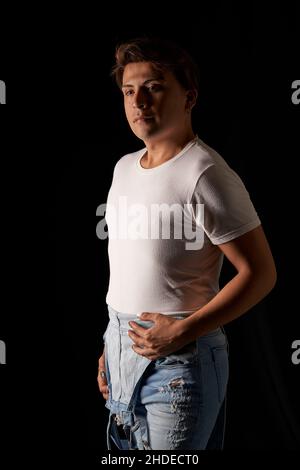 portrait latin man in studio black background Stock Photo