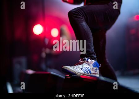 Bergen, Norway. 07th, August 2021.  An artist wears a pair of vintage sneakers from Addias at a live concert in Bergen. (Photo credit: Gonzales Photo - Jarle H. Moe). Stock Photo