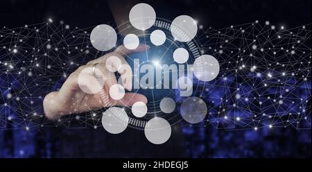 Innovation, big data concept technology. Hand hold digital hologram circular diagram sign on city dark blurred background. Social media concept. Commu Stock Photo