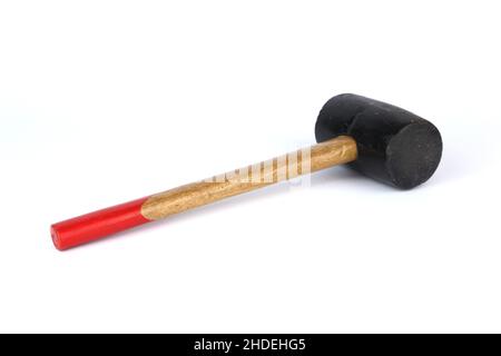 An old used rubber hammer (mallet) on a white background, copy space Stock Photo
