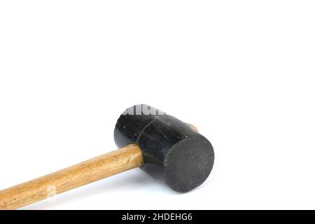 An old used rubber hammer (mallet) on a white background, copy space Stock Photo
