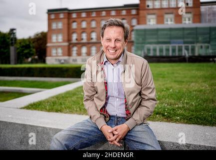 13 September 2021, Schleswig-Holstein, Kiel: Thomas Losse-Müller, (SPD), his party's top candidate for the upcoming state elections, sits in front of the state parliament on the fjord. Photo: Axel Heimken/dpa Stock Photo