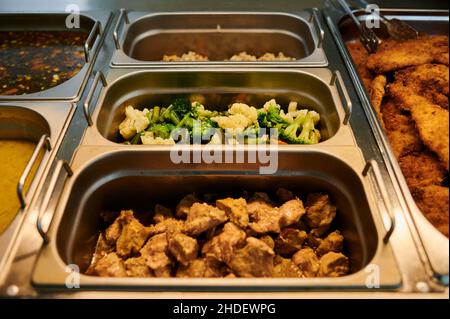 In the public dining room, you can choose from a variety of dishes Stock Photo
