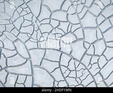 Cracked white clay on dried lakebed, natural pattern Stock Photo