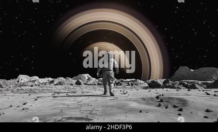 A background of an astronaut on the moon looking at the planet Stock Photo