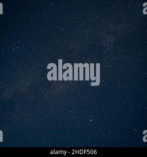 Beautiful view of a blue night sky and stars on dark background Universe filled with stars Stock Photo