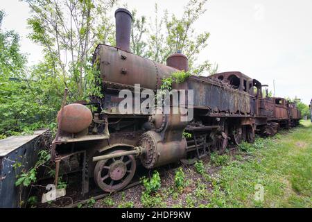 Old and rusty steam locomotive abandoned on an lost place train station Stock Photo