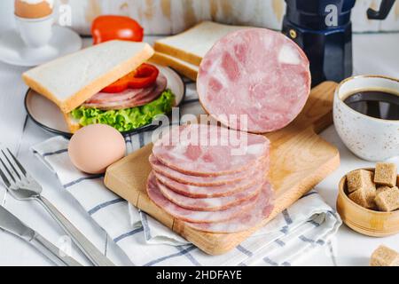 Breakfast with ham, coffee, egg and sandwich Stock Photo
