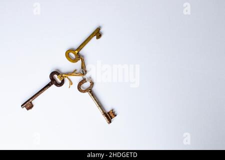 Vintage three keys isolated on white background Stock Photo