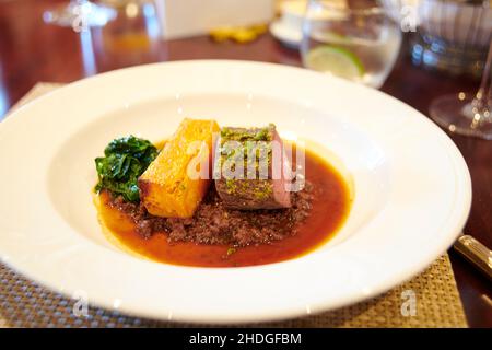 Venison Ragu crusted with roast pistachio nuts   created by Michel Roux Jr, Stock Photo