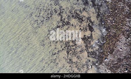 Aerial Photograph of Llanrhystud Beach, lime Kilns, Sea and Village. Stock Photo