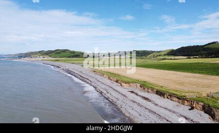 Aerial Photograph of Llanrhystud Beach, lime Kilns, Sea and Village. Stock Photo