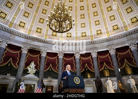 Washington, DC, USA. 06th Jan, 2022. U.S. President Joe Biden delivers remarks on the one year anniversary of the January 6 attack on the U.S. Capitol, during a ceremony in Statuary Hall at the U.S. Capitol on January 06, 2022 in Washington, DC. One year ago, supporters of President Donald Trump attacked the U.S. Capitol Building in an attempt to disrupt a congressional vote to confirm the electoral college win for Joe Biden. Credit: Drew Angerer/Pool Via Cnp/Media Punch/Alamy Live News Stock Photo