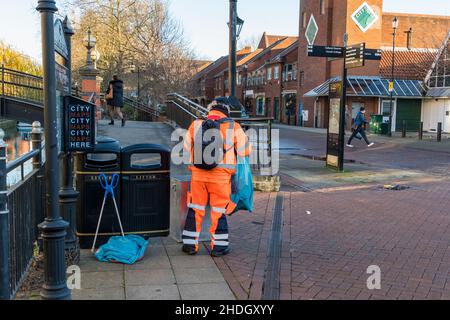 Council worker emptying litter bin city square Lincoln city 2021 Stock Photo