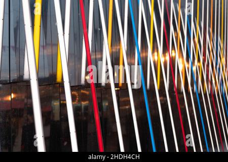 Abstract vertical lines in the architecture of the city. Rhythmic background. Stock Photo