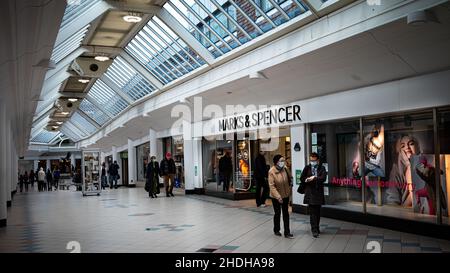 Marks & Spencer department store in Swan Walk shopping centre, Horsham, West Sussex. Footfall in shopping centres and otrer retail areas has dropped c Stock Photo