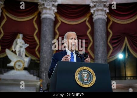 Washington, DC, USA. 06th Jan, 2022. U.S. President Joe Biden delivers remarks on the one year anniversary of the January 6 attack on the U.S. Capitol, during a ceremony in Statuary Hall at the U.S. Capitol on January 06, 2022 in Washington, DC. One year ago, supporters of President Donald Trump attacked the U.S. Capitol Building in an attempt to disrupt a congressional vote to confirm the electoral college win for Joe Biden. Credit: Drew Angerer/Pool Via Cnp/Media Punch/Alamy Live News Stock Photo