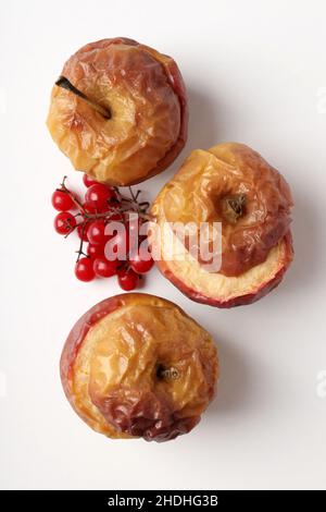 Concept of tasty food with baked apples on white background Stock Photo