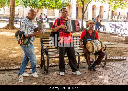 SANTO DOMINGO, DOMINICAN REPUBLIC - NOVEMBER 18, 2018: Local musicians at Parque Colon park in Santo Domingo, capital of Dominican Republic. Stock Photo