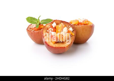 Stuffed baked apples isolated on white background Stock Photo